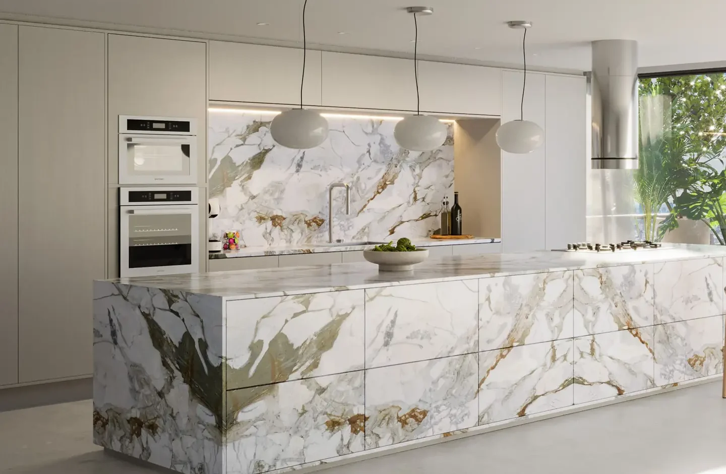 Cozinha com ilha e painel em mármore dolomítico Calacatta Matarazzo X
