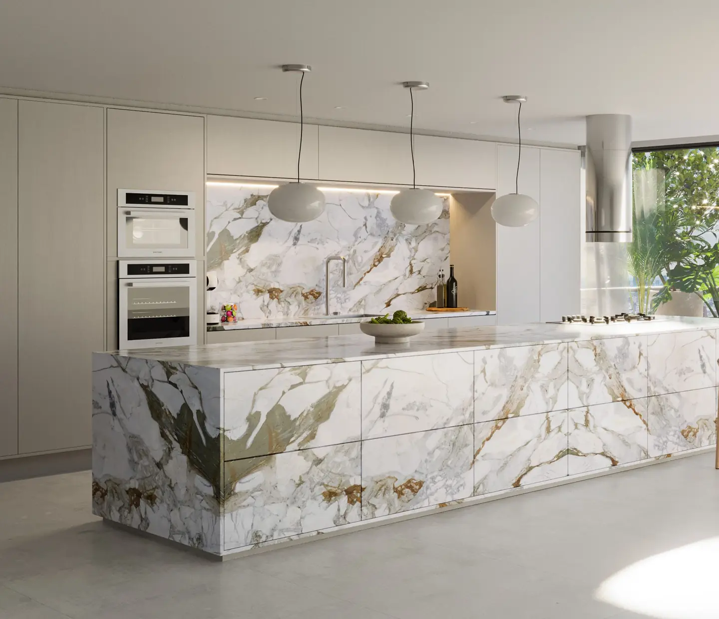 Cozinha com ilha e painel em mármore dolomítico Calacatta Matarazzo X